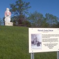We've put up a sign detailing the history behind the Santa Statue and the restoration work getting ready to begin.